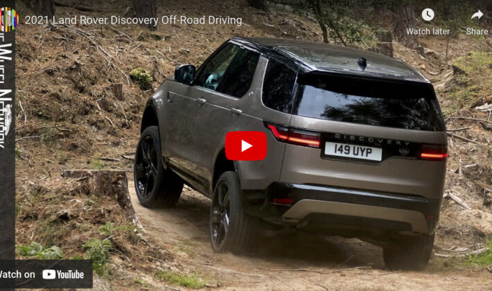 video cover image of a Land Rover Discovery driving on a dirt road