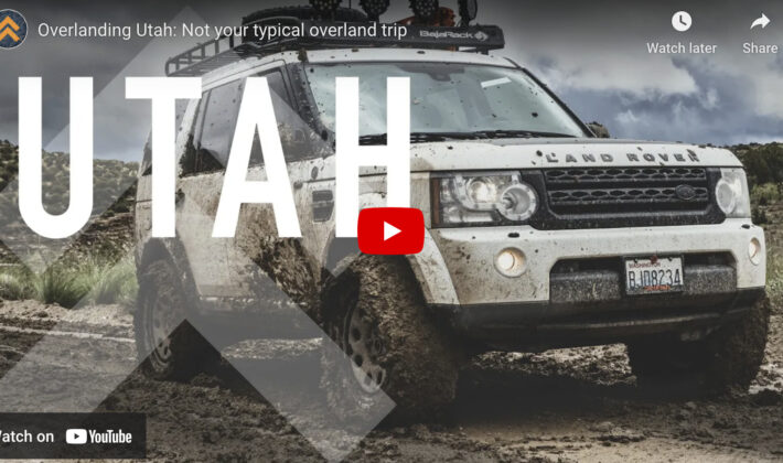 video cover image of a white Land Rover LR4 driving in mud