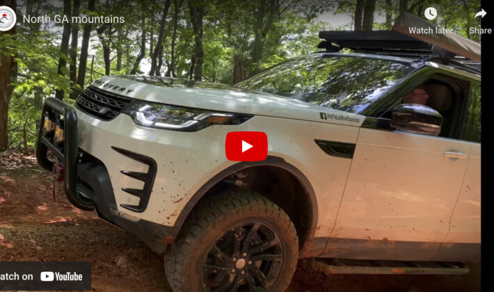 video cover image of a Discovery 5 driving off road