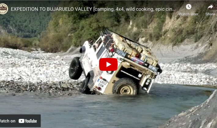 video cover image of a Land Rover Defender 110 crossing a river