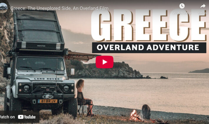 video cover image of a Land Rover Defender on a beach